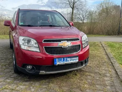 Second-hand Chevrolet Orlando LT 163 CP (119 kW) 2011 Roșu Monovolum