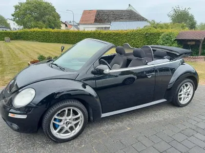 Gebraucht VW New Beetle 75 PS (55 kW) 2006 Schwarz Kleinwagen
