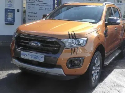Gebraucht Ford Ranger Wildtrack 212 PS (155 kW) 2020 Canyonorange metallic (metallic) Pickup