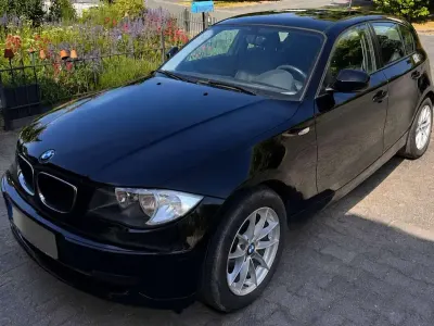 Gebraucht BMW 116 122 PS (89 kW) 2010 Schwarz Kleinwagen