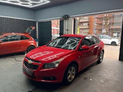 Second-hand Chevrolet Cruze 124 CP (91 kW) 2010 Roșu Berlinǎ