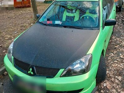 Second-hand Mitsubishi Lancer 135 CP (99 kW) 2006 Negru Break