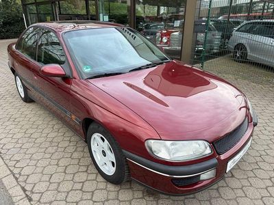 Second-hand Opel Omega 136 CP (100 kW) 1996 Roșu Berlinǎ