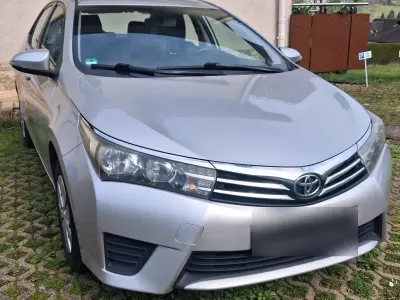 Używany Toyota Corolla 99 KM (72 kW) 2014 Szary Sedan/Limuzyna