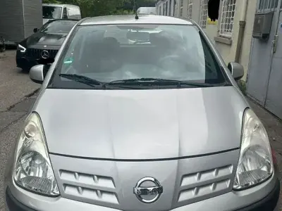 Gebraucht Nissan Pixo Acenta 68 PS (50 kW) 2009 Silber Kleinwagen