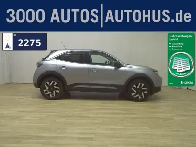 Gebraucht Opel Mokka Elegance 131 PS (96 kW) 2023 Kontrast grau/quarz silber (metallic) SUV