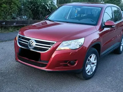 Używany VW Tiguan 140 KM (102 kW) 2009 Czerwony SUV