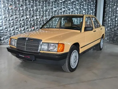 Używany Mercedes 190 72 KM (52 kW) 1986 Żółty Sedan/Limuzyna