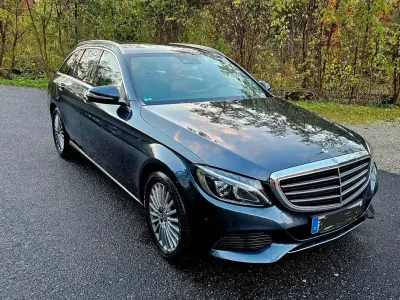 Używany Mercedes C180 Exclusive 156 KM (114 kW) 2014 Szary Kombi