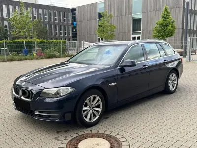 Używany BMW 518 136 KM (100 kW) 2015 Niebieski Kombi