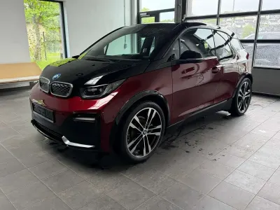 Gebraucht BMW i3 Performance 183 kW (250 PS) 2022 Aventurinrot m.akz. frozen gre Kleinwagen