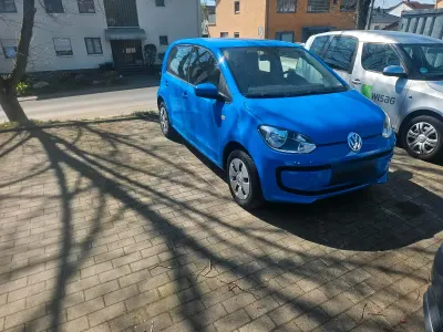 Używany VW up! 60 KM (44 kW) 2014 Niebieski Hatchback