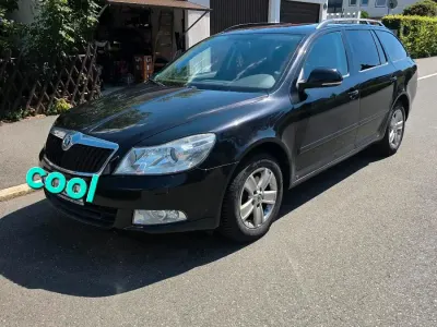 Gebraucht Skoda Octavia 103 PS (75 kW) 2011 Schwarz Kombi