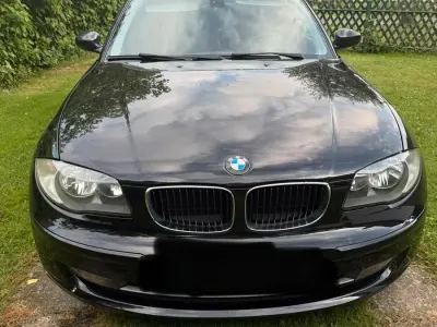 Gebraucht BMW 116 122 PS (89 kW) 2010 Schwarz Kleinwagen