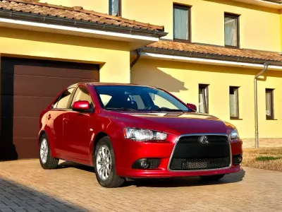 Gebraucht Mitsubishi Lancer Top 150 PS (110 kW) 2011 Rot Limousine