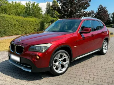 Gebraucht BMW X1 xLine 177 PS (130 kW) 2009 Rot SUV