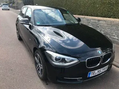 Gebraucht BMW 116 Sport Line 136 PS (100 kW) 2014 Schwarz Kleinwagen