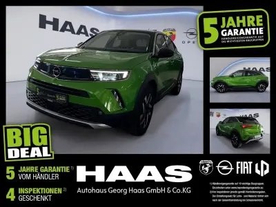 Gebraucht Opel Mokka Elegance 131 PS (96 kW) 2022 Matcha green/ikone gruen SUV