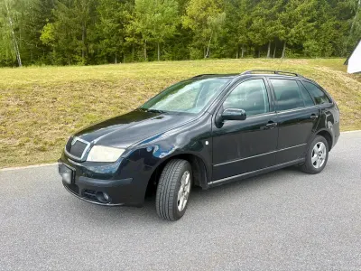 Używany Skoda Fabia 80 KM (58 kW) 2007 Czarny Kombi