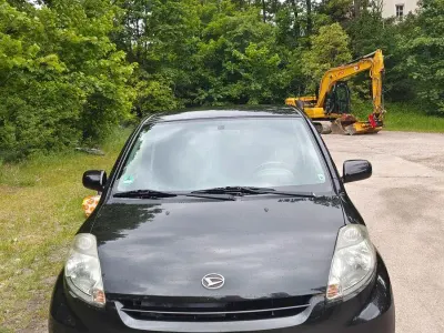 Gebraucht Daihatsu Sirion 91 PS (66 kW) 2008 Schwarz Kleinwagen
