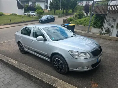 Używany Skoda Octavia 105 KM (77 kW) 2011 Srebrny Sedan/Limuzyna