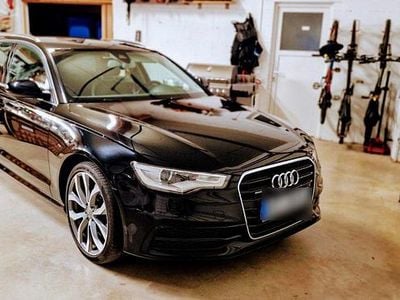 Używany Audi A6 Ambiente 245 KM (180 kW) 2014 Czarny Kombi