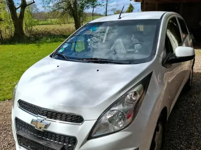 Gebraucht Chevrolet Spark 68 PS (50 kW) 2013 Weiß Kleinwagen