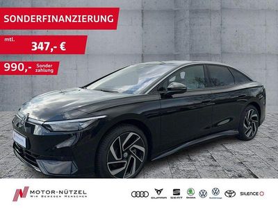 Gebraucht VW ID.7 Pro 210 kW (286 PS) 2023 Grenadillschwarz metallic Kleinwagen
