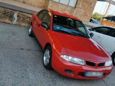 Gebraucht Mitsubishi Carisma 120 PS (88 kW) 1996 Rot Kleinwagen