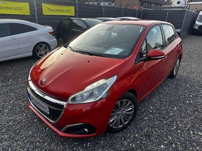 Gebraucht Peugeot 208 Signature Sky 82 PS (60 kW) 2018 Orange power/metallic Kleinwagen