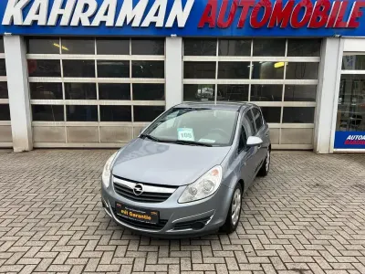 Używany Opel Corsa Edition 80 KM (58 kW) 2009 Srebrny Hatchback