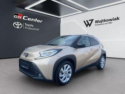 Gebraucht Toyota Aygo X Comfort 72 PS (52 kW) 2022 Ginger beige metallic/ night sky black SUV