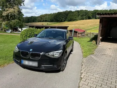 Gebraucht BMW 118 Sport Line 143 PS (105 kW) 2013 Schwarz Kleinwagen