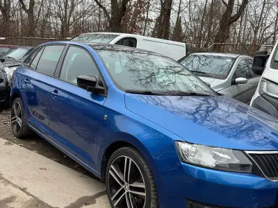 Używany Skoda Rapid 105 KM (77 kW) 2014 Niebieski Hatchback