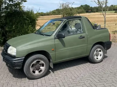 Gebraucht Suzuki Grand Vitara 127 PS (93 kW) 1999 Grün Cabrio
