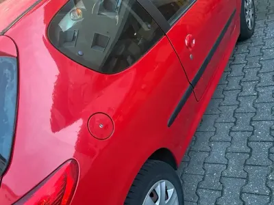 Gebraucht Peugeot 206+ 75 PS (55 kW) 2009 Rot Kleinwagen