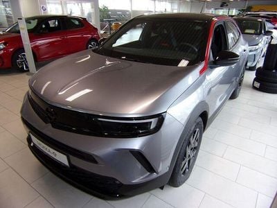 Gebraucht Opel Mokka-e 100 kW (136 PS) 2024 Grau (kontrast grau metallic) SUV