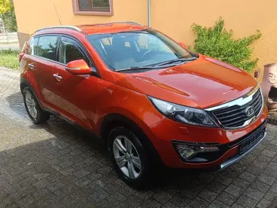 Używany Kia Sportage Vision 163 KM (119 kW) 2012 Pomarańczowy SUV