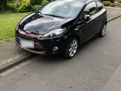 Gebraucht Ford Fiesta Trend 82 PS (60 kW) 2012 Schwarz Limousine