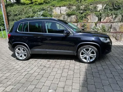 Second-hand VW Tiguan Sportline 170 CP (125 kW) 2008 Negru SUV