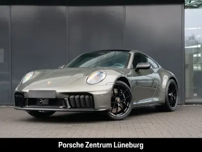 Gebraucht Porsche 992 541 PS (397 kW) 2026 Aventuringrünmetallic Coupé