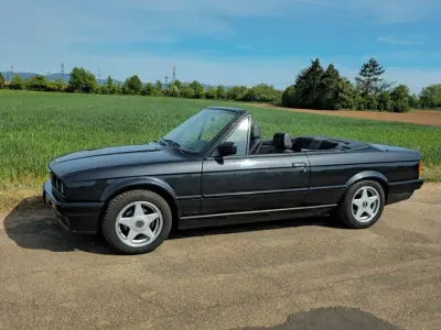 Gebraucht BMW 318 Cabriolet Sport Line 113 PS (83 kW) 1992 Schwarz Cabrio