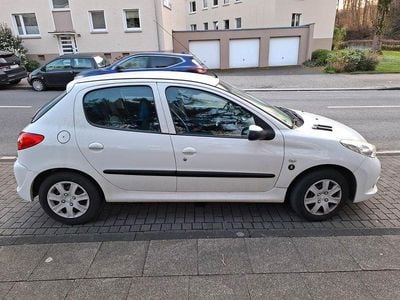 Gebraucht Peugeot 206 73 PS (53 kW) 2011 Weiß Limousine