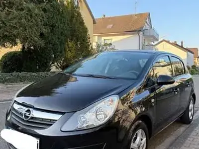 Używany Opel Corsa Edition 69 KM (50 kW) 2010 Czarny Hatchback