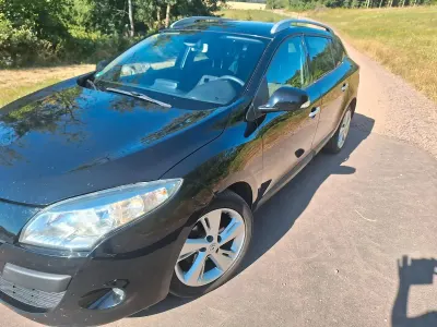 Gebraucht Renault Mégane GrandTour 106 PS (77 kW) 2011 Schwarz Kombi