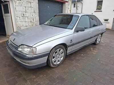 Second-hand Opel Omega 150 CP (110 kW) 1992 Argintiu Break