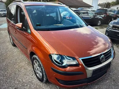 Używany VW Touran Freestyle 140 KM (102 kW) 2009 Czerwony Minivan