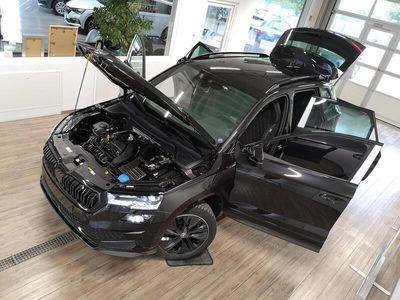 gebraucht Skoda Karoq Sportline 1,5TSI DSG+AHK+NAV+ACC+5J.GARANT