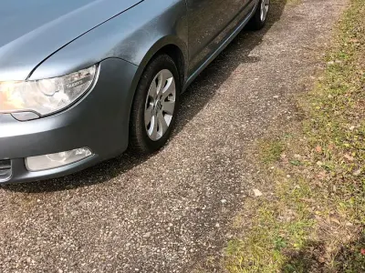 Używany Skoda Superb 160 KM (117 kW) 2012 Srebrny Sedan/Limuzyna