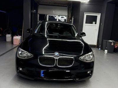 Second-hand BMW 114 102 CP (75 kW) 2014 Negru Hatchback